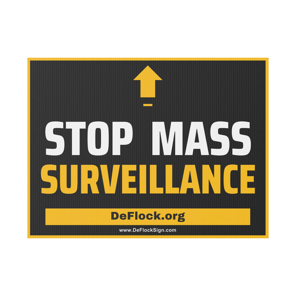Yard sign with an arrow pointing upwards, and a message that says "Stop Mass Surveillance" to indicate that above the sign is a surveillance camera.