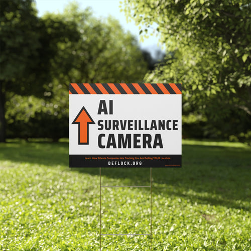 Yard sign with an arrow pointing upwards, and a message that says "AI Surveillance Camera" to indicate that above the sign is a surveillance camera.