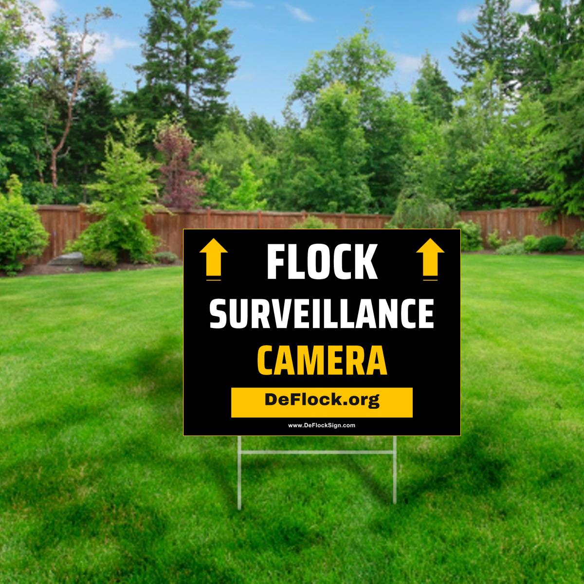DeFlock Signs Flock Surveillance Camera yard sign mockup showing the full back view on a 24x18 inch sign.